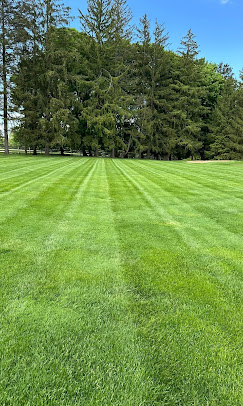 Striped residential lawn maintained by JW Landscaping in Northern Kentucky